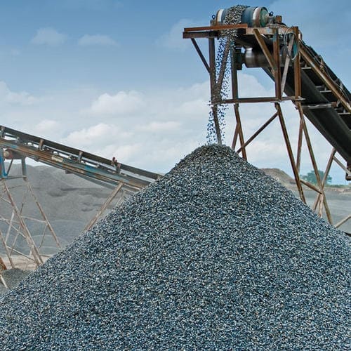 Graded aggregate stockpiled for supply around Rishikesh